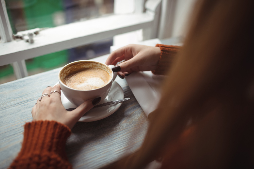woman-holding-coffee-cup