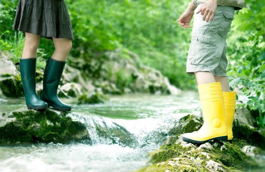 standing on two sides of a stream